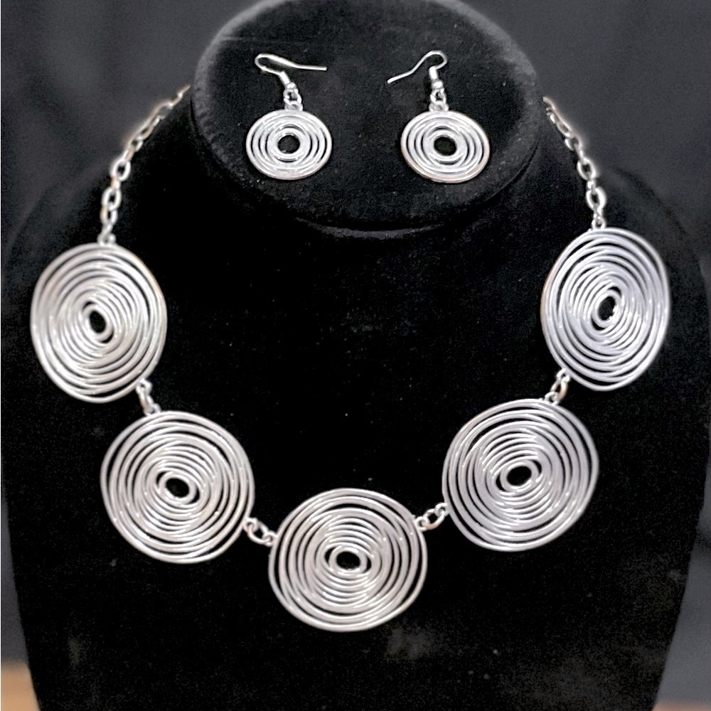 Silver tone abstract circles design necklace and matching earrings​​​​​